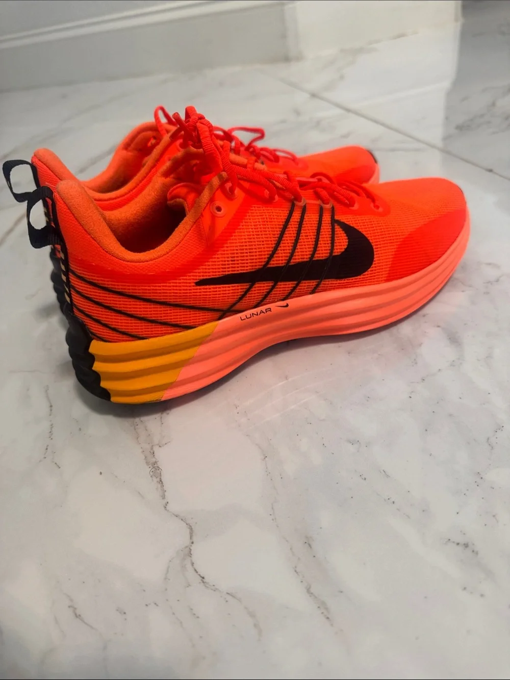 Nike Women’s Bright Orange and Black Running Sneakers
